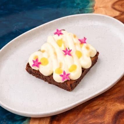 Banana bread — Moist banana bread with chocolate, topped with mascarpone cream and salted caramel. Sweet, creamy, a