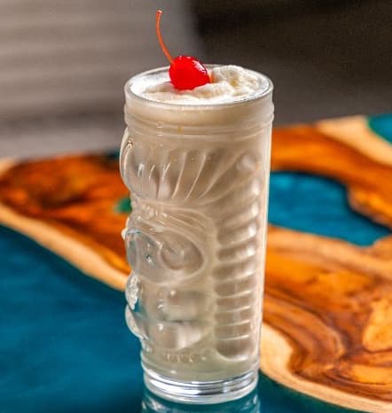 Banana with milk — Creamy banana shake blended with chilled milk. Rich, smooth, and comforting with natural sweetness.