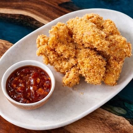Chicken strips — Crunchy fried chicken strips with juicy chicken inside. Crispy, tender, and perfect for sharing.