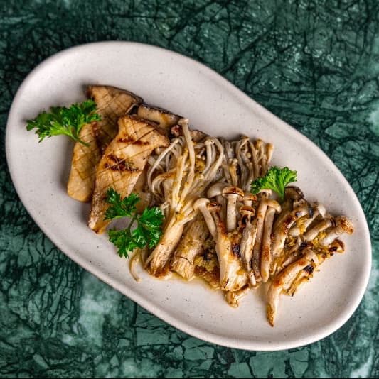 Grill mushroom mix — A mix of oyster mushrooms, shimeji, and enoki grilled to perfection. Earthy, juicy, and aromatic.