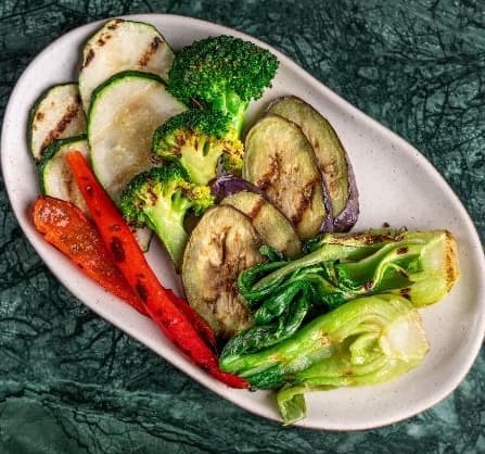 Grilled veggies — Fresh grilled vegetables including zucchini, eggplant, broccoli, and bok choy. Light, healthy, and f
