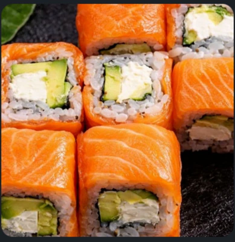 Philadelphia Uramaki 8 pcs — A roll with salmon, cream cheese, and avocado for a rich flavor