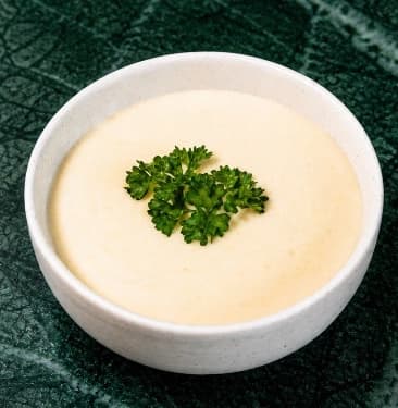 Potato puree — Creamy homemade mashed potatoes finished with parmesan. Smooth, rich, and comforting.