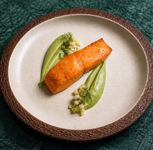 Salmon steak with broccoli avocado puree — Baked salmon steak glazed with orange sauce and served with creamy broccoli-avocado puree. Finished