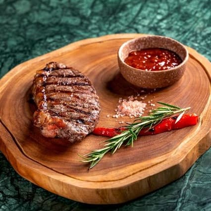 Striploin — Classic striploin steak with a balanced texture and bold meaty taste. Grilled to keep it tender and