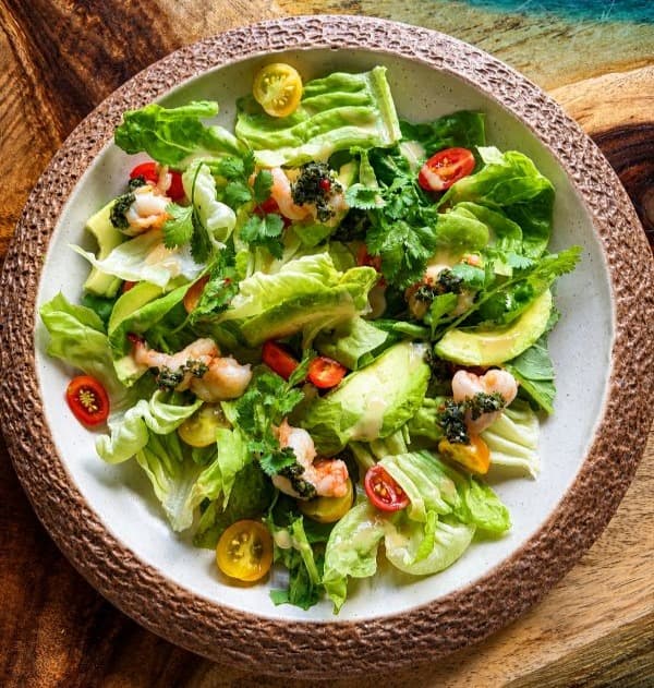 Vitello tonatto salad —
Fresh romano and rucola salad served with creamy Vitello Tonnato sauce, avocado, and cherry tomatoe